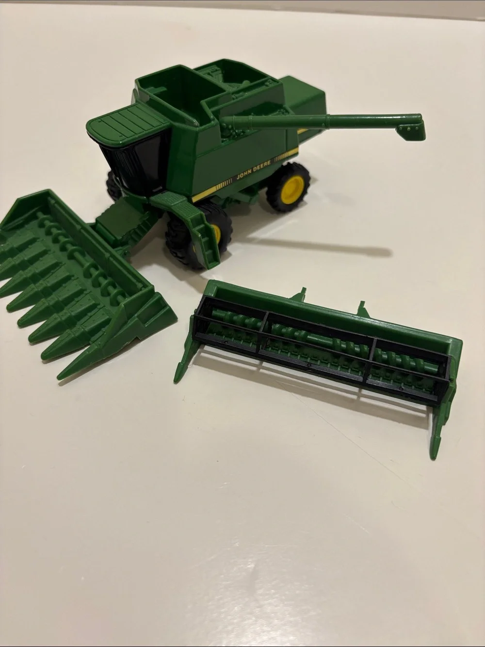 Ertl John Deere combine with two headers. Item 5604. 1/64 scale.